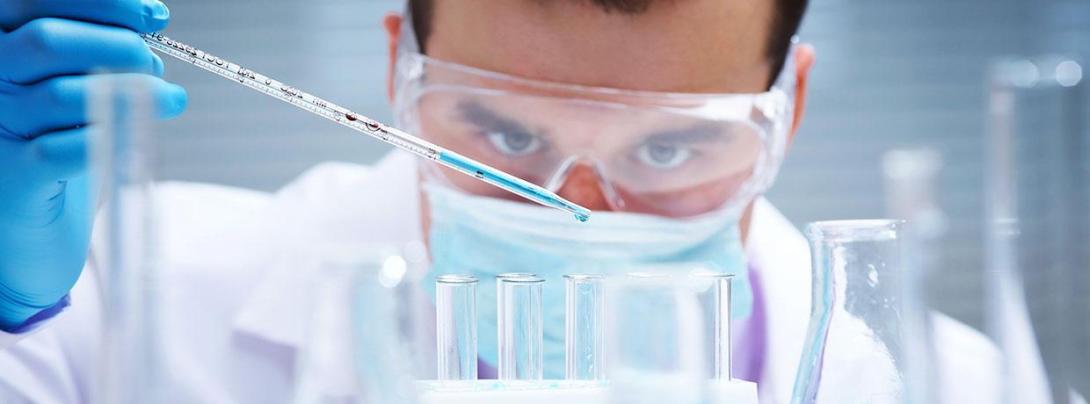 Man in a laboratory testing water 